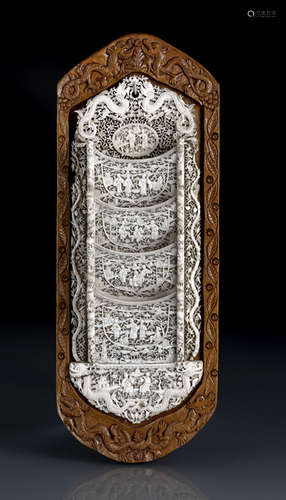 A FINELY CARVED IVORY PAPER HOLDER