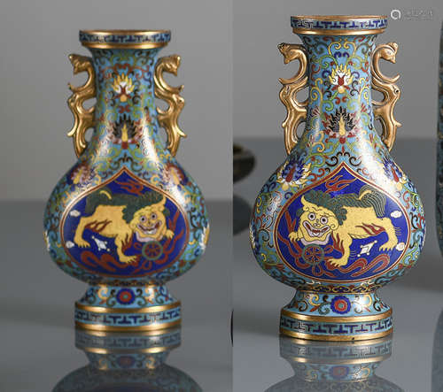 A PAIR OF PART-GILT CLOISONNÉ ENAMEL WALL VASES WITH BUDDHIST LIONS