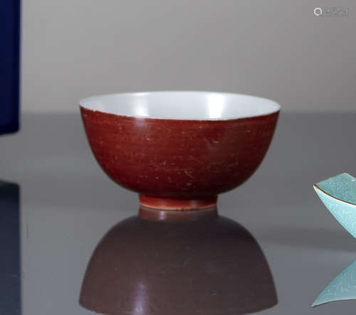 AN IRON-RED KINRANDE BOWL