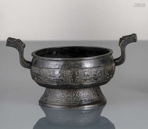 A BRONZE CENSER IN ARCHAIC STYLE