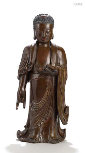 A LACQUERED WOOD SCULPTURE OF STANDING BUDDHA
