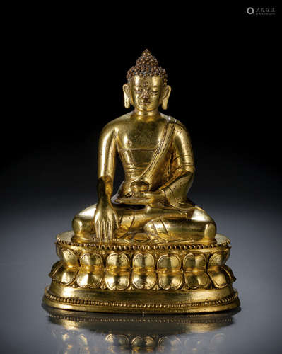 A GILT-BRONZE FIGURE OF BUDDHA SHAKYAMUNI