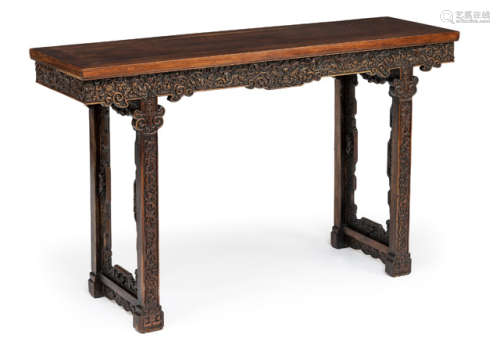 A HARDWOOD TABLE WITH DRAGON CARVING