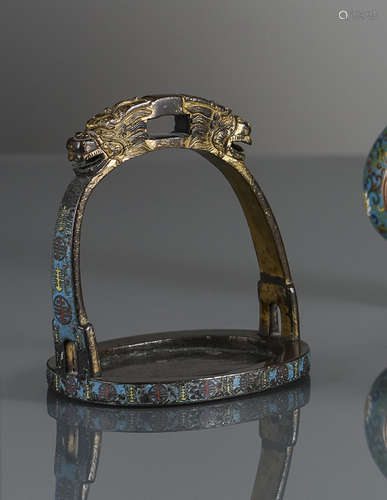 A GILT-BRONZE STIRRUP WITH ENANEL DECORATION