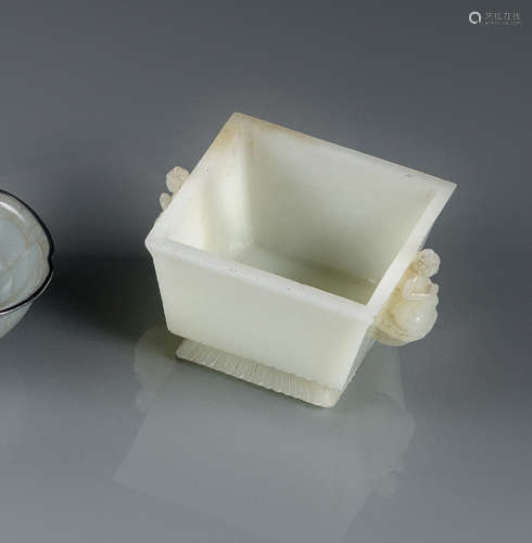 A SQUARE LIGHT GREEN JADE BOWL AND COVER WITH BUDDHA HANDLES