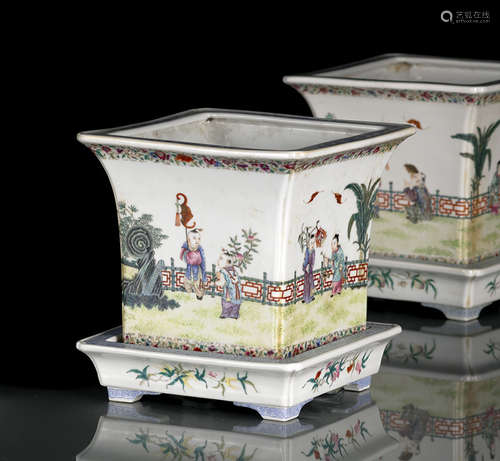 A PAIR OF FAMILLE ROSE PORCELAIN JARDINIÈRES AND STANDS