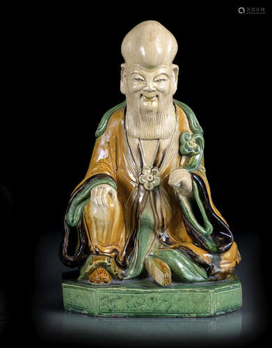 A SANCAI-GLAZED POTTERY FIGURE OF SHOULAO