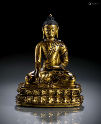 A GILT-BRONZE FIGURE OF BUDDHA SHAKYAMUNI