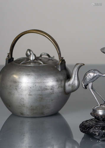 A TIN TEAPOT AND COVER WITH PEACHES