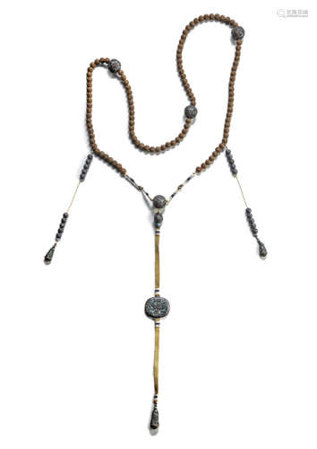 A COURT NECKLACE WITH 108 CARVED WOODEN BEADS AND ENAMEL SILVER BALLS AND PENDANTS