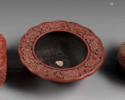 A CINNABAR LACQUER BOWL AND A BOX AND COVER