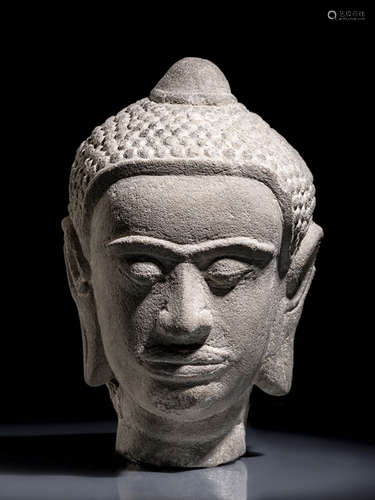 A SANDSTONE HEAD OF BUDDHAMUCHALINDA