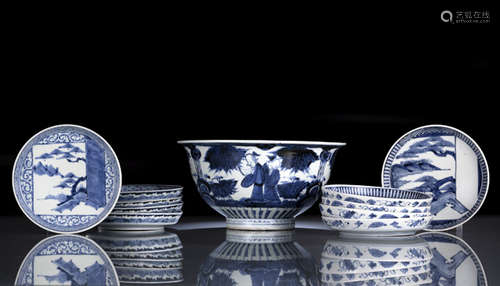 A GROUP OF TEN BLUE AND WHITE DISHES AND A DEEP BOWL