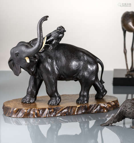 A BRONZE MODEL OF AN ELEPHANT