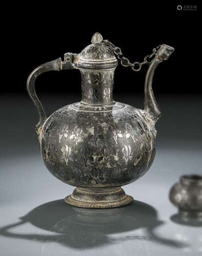A SILVER-INLAID BRONZE EWER AND COVER