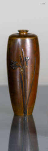 A BRONZE DAFFODILS VASE