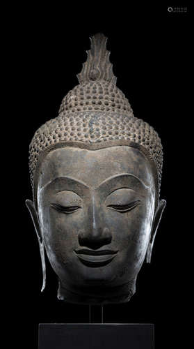 A BRONZE HEAD OF BUDDHA SHAKYAMUNI