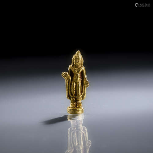 A GOLD FIGURINE OF BUDDHA SHAKYAMUNI