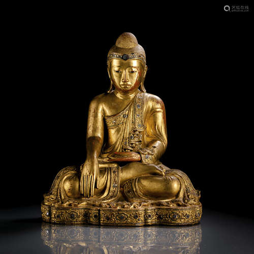 A GILT-LACQUERED WOOD FIGURE OF BUDDHA SHAKYAMUNI