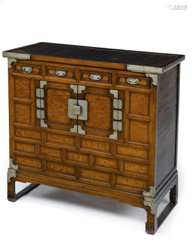 A WOODEN CABINET WITH METAL FITTINGS