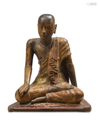 A GILT- AND RED-LACQUERED WOOD FIGURE OF A MONK BURMA