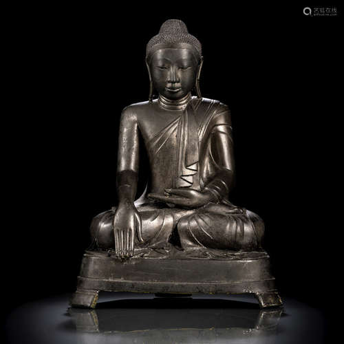 A BRONZE FIGURE OF BUDDHA SHAKYAMUNI