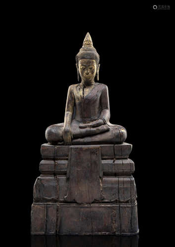 A PARCEL GILT-LACQUERED WOOD FIGURE OF BUDDHA SHAKYAMUNI NORTH THAILAND