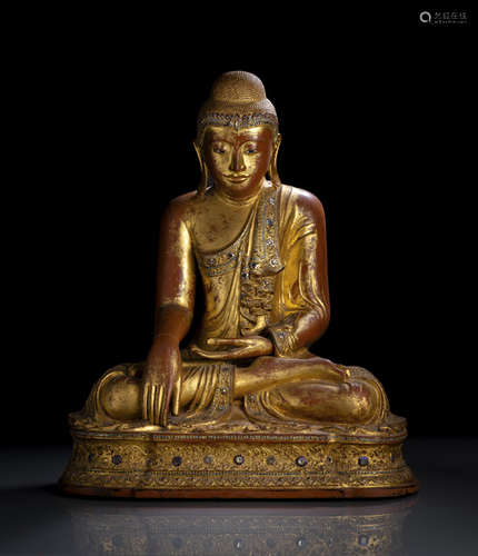 A GILT- AND RED-LACQUERED WOOD FIGURE OF BUDDHA SHAKYAMUNI BURMA