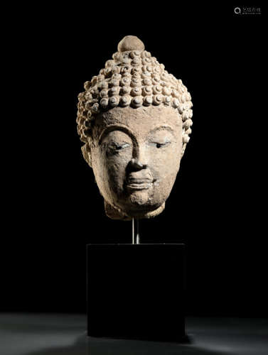 A STUCCO HEAD OF BUDDHA SHAKYAMUNI