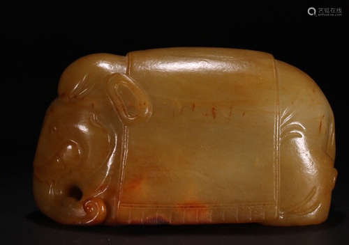 A YELLOW JADE ELEPHANT