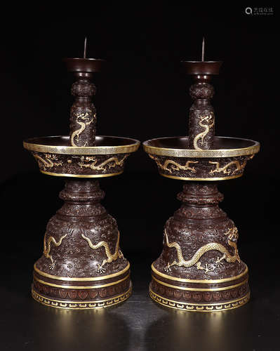 A PAIR OF XIANFENG MARK PARTLY GILT CANDLESTICKS