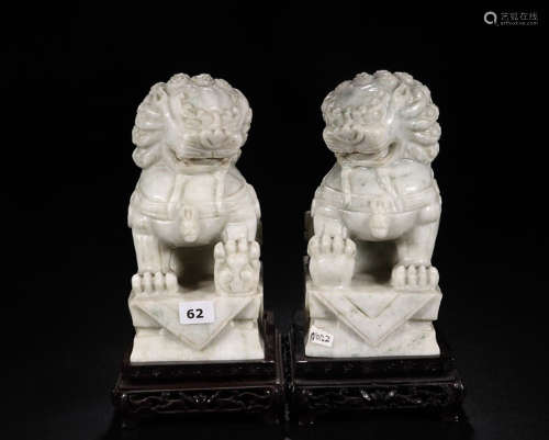 A PAIR OF JADE LIONS