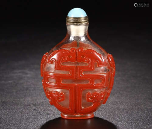 A DRAGON PATTERN RED HOLLOW-OUT SNUFF BOTTLE