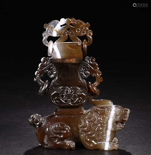 AN AMBER LION CENSER