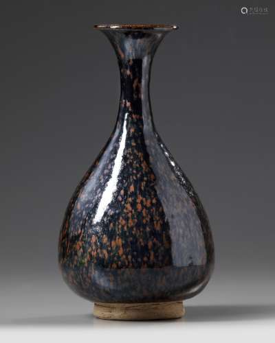 A Chinese black glazed rust-splashed pear-shaped vase