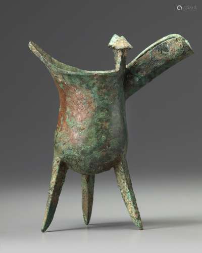 A Chinese bronze tripod ritual tripod vessel, jue