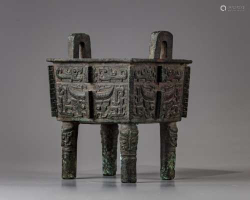 A Chinese bronze square shaped incense burner, fangding