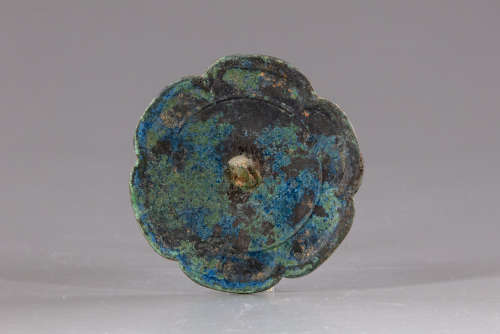 A Chinese six-lobed bronze scholar mirror