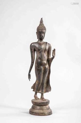 Buddha Marchand une main en Abaya mudra . Bronze .…