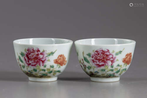 A pair of Chinese famille rose 'butterfly and flowers' cups