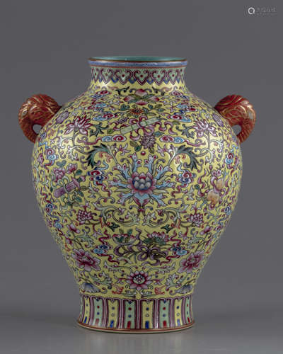 A Chinese famille rose yellow ground vase