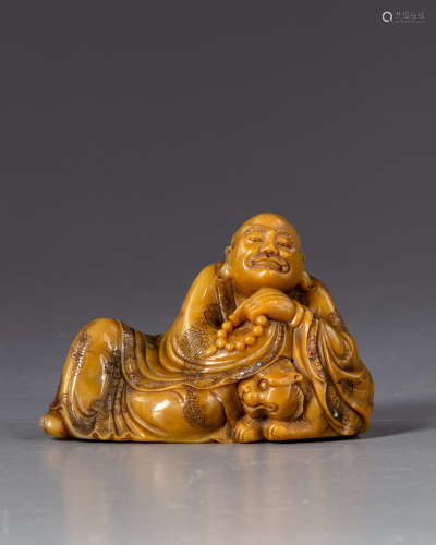 A Chinese soapstone figure of a Luohan