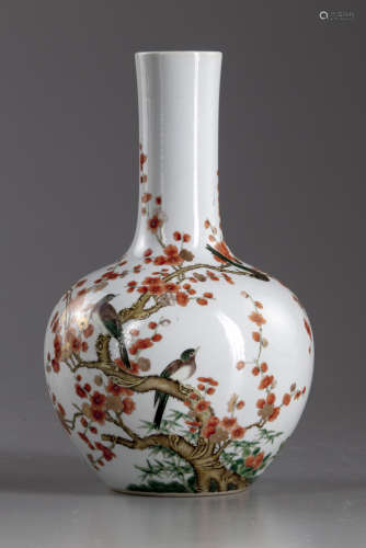 A Chinese famille rose ‘magpie and prunus’ bottle vase