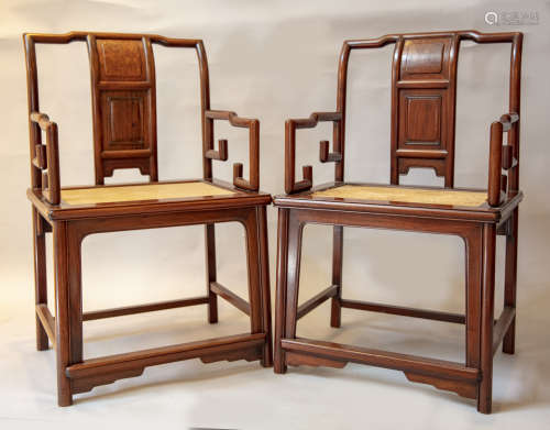 A pair of two Chinese wooden chairs