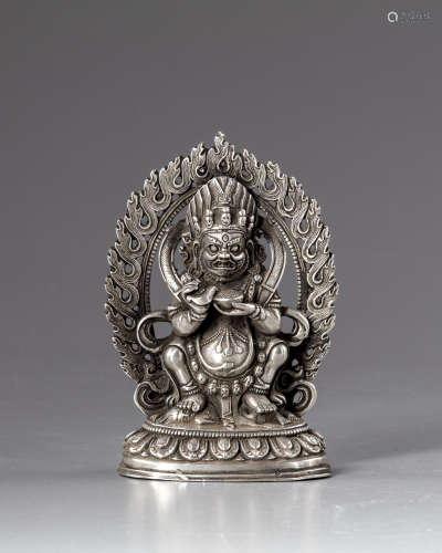 A Sino-Tibetan silver figure of Mahakala