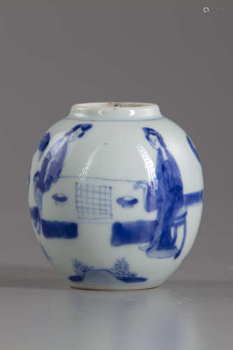 A small blue and white jar and cover