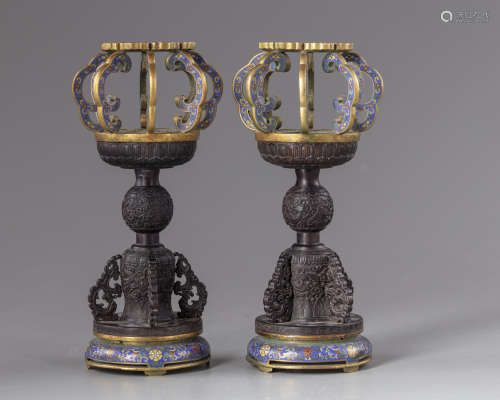 A pair of Chinese hongmu and cloisonné enamel hat stands