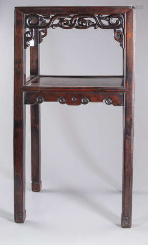 A Chinese hardwood table with a inset porcelain plaque