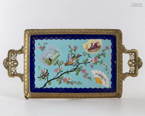A Chinese porcelain plaque mounted in a bronze monture