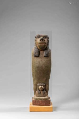 Thot, le dieu égyptien à tête de babouin. Stuc polychrome. Egypte. H : 40cm -